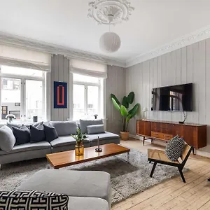 Dinbnb Comfortable 2-bed Urban Escape With Apple Tv & Cozy Features Apartment